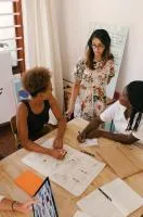 People in a discussion around a table