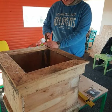 service users working in the construction barn