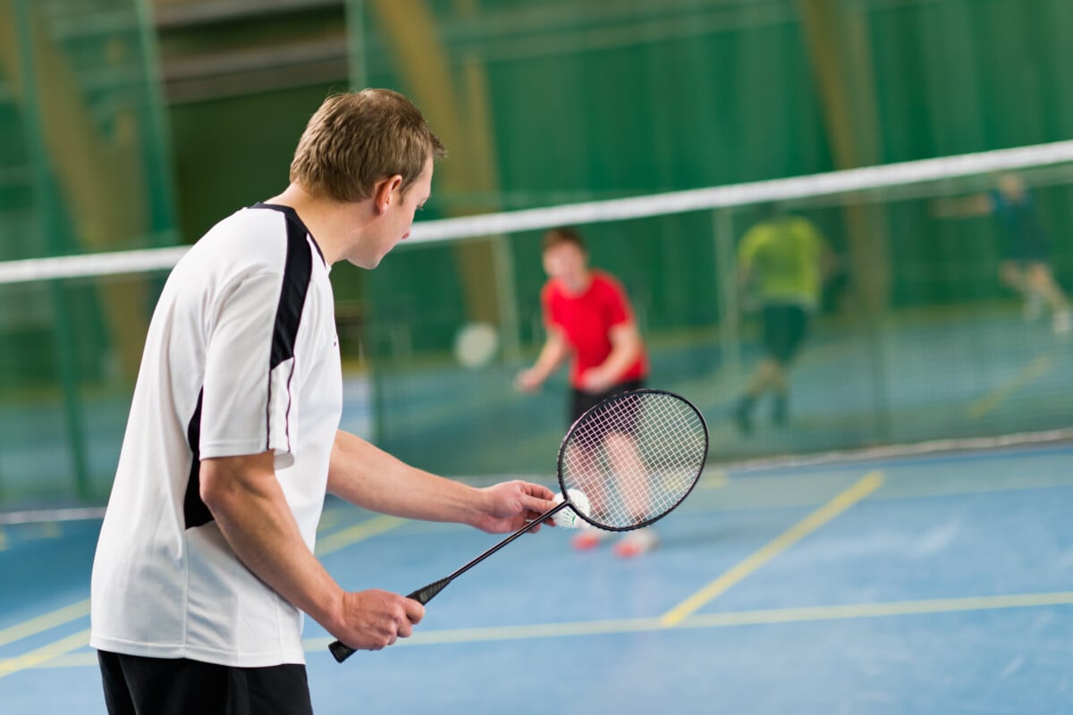 Man playing badminton