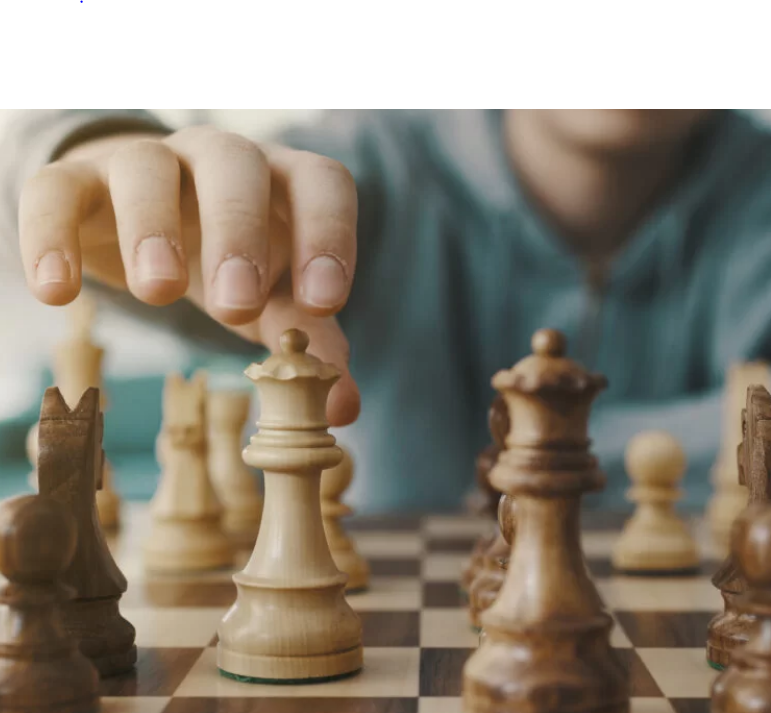 Person Playing Chess