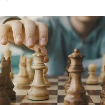 Person Playing Chess