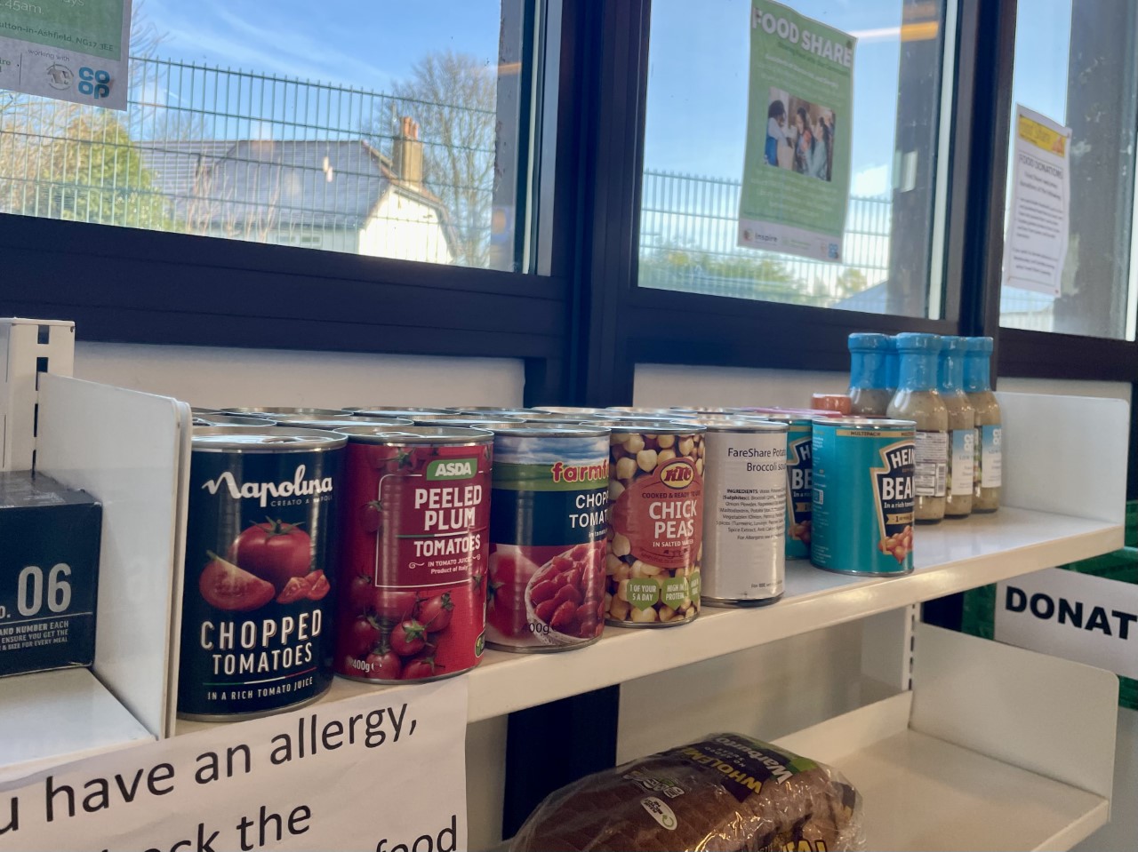 A shelf of tinned food