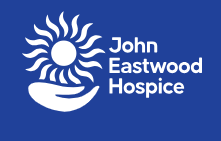 White image and text on blue background
Stylised sun resting in a cupped hand with hospice name to the right
hand side