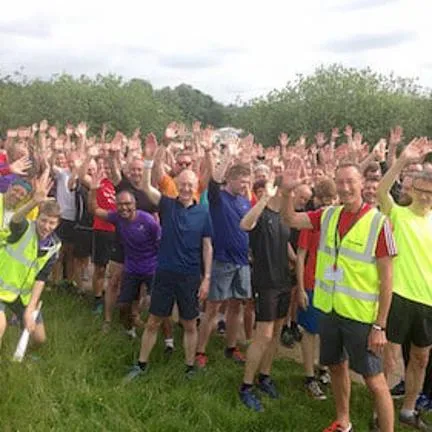 Parkrun event photo crowd of runners