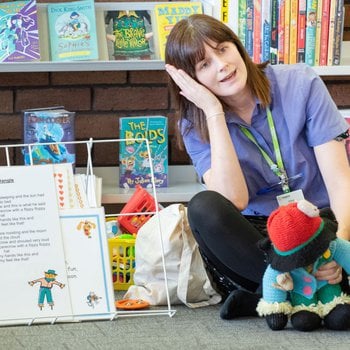 Library staff leading a children's session.