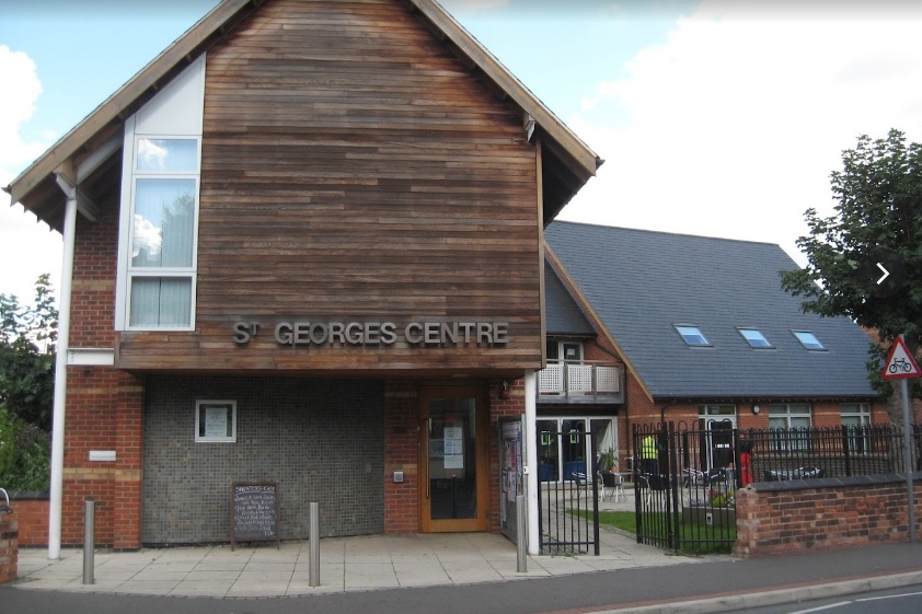 Front of building photo with text St Georges Centre