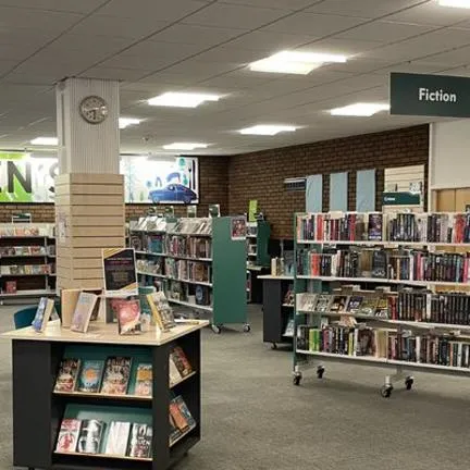 Inside of Sutton-in-Ashfield Library. Books are neatly organised of shelves.