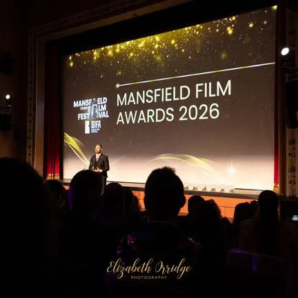 At the Mansfield Palace Theatre for the MTFF26 awards ceremony - the big screen showing a title slide for the awards
